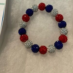 Stretch braclet. Handmade. Perfect for Labor Day. It’s 6.5 inches.